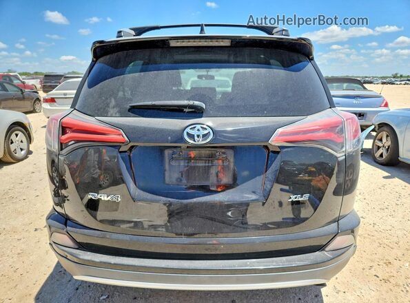 2T3WFREV0GW252242 2016 TOYOTA RAV4 Black Вид ззаду