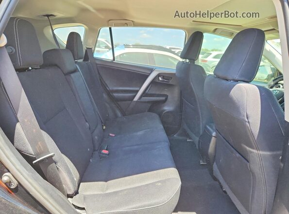 2T3WFREV0GW252242 2016 TOYOTA RAV4 Black Вид задніх сидінь