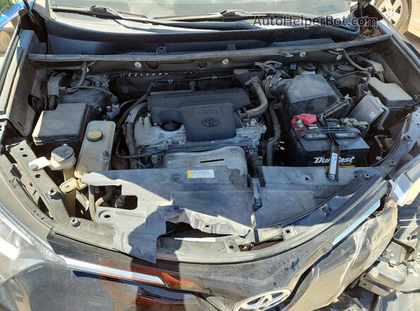 2T3WFREV0GW252242 2016 TOYOTA RAV4 Black Вид задньої частини салону