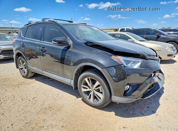2T3WFREV0GW252242 2016 TOYOTA RAV4 Black Передня права чверть