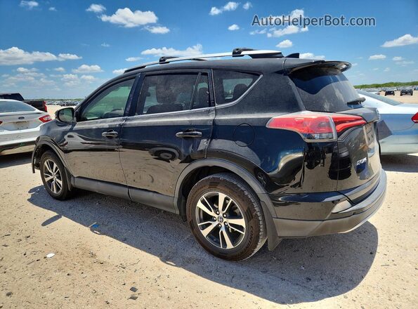 2T3WFREV0GW252242 2016 TOYOTA RAV4 Black Задня ліва чверть
