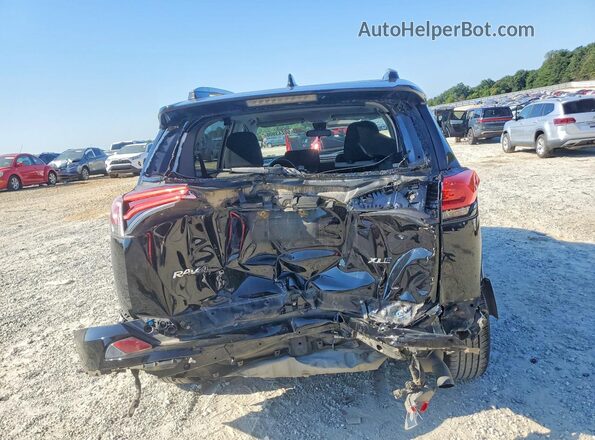 2T3WFREV0HW387853 2017 TOYOTA RAV4 Black Vista trasera