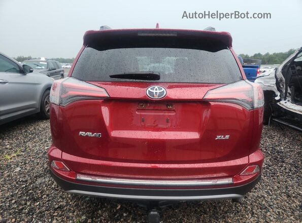 2T3WFREV0JW432375 2018 TOYOTA RAV4 Burgundy Widok z tyłu
