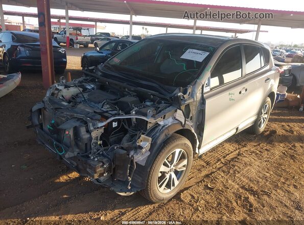 2T3WFREV1GW279384 2016 TOYOTA RAV4 Серый Передняя левая четверть