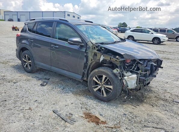 2T3WFREV1GW280213 2016 TOYOTA RAV4 Gray Front right