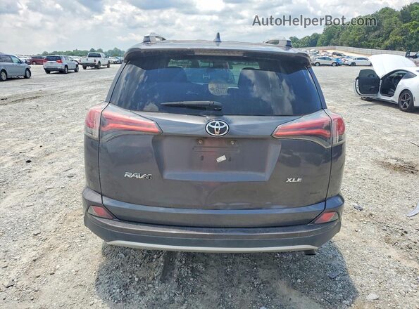 2T3WFREV1GW280213 2016 TOYOTA RAV4 Gray Rear view