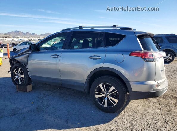 2T3WFREV1GW296511 2016 TOYOTA RAV4 Silver Rear right