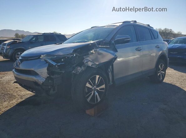 2T3WFREV1GW296511 2016 TOYOTA RAV4 Silver Rear left