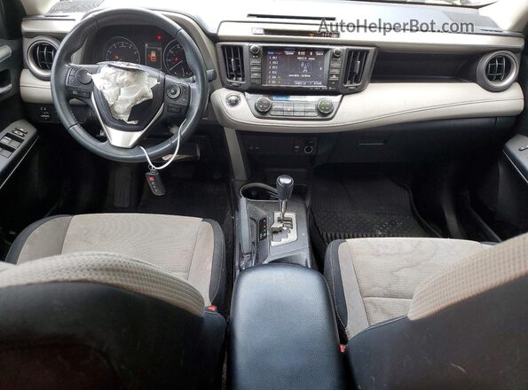 2T3WFREV1HW403879 2017 TOYOTA RAV4 Серебряный Вид панели приборов