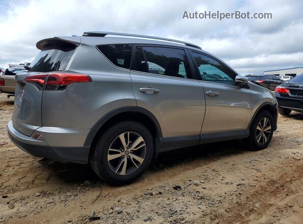 2T3WFREV1HW403879 2017 TOYOTA RAV4 Серебряный Задняя правая четверть