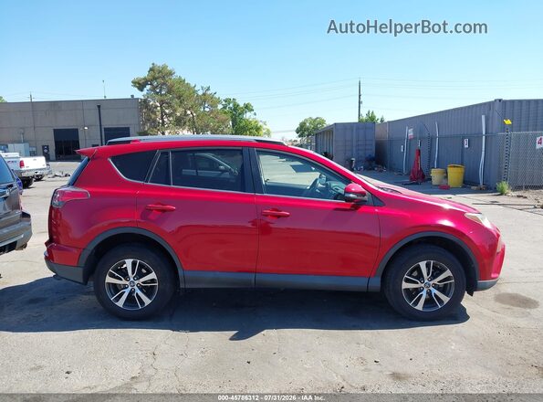 2T3WFREV2HW371234 2017 TOYOTA RAV4 Red Widok wnętrza z tyłu