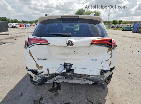 2T3WFREV2HW380273 2017 TOYOTA RAV4 White Rear view