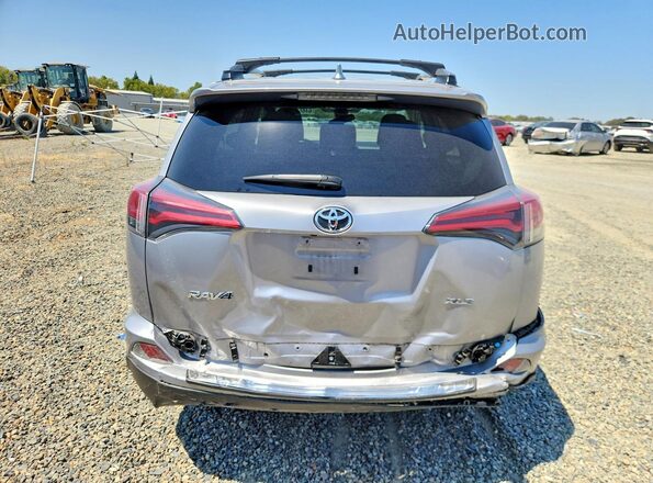 2T3WFREV2HW398174 2017 TOYOTA RAV4 Silver Widok z tyłu