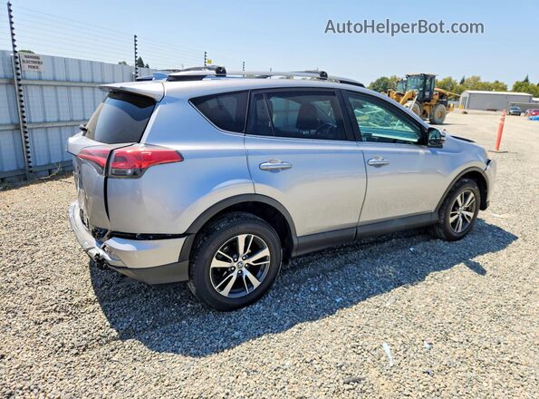 2T3WFREV2HW398174 2017 TOYOTA RAV4 Silver Tył prawy