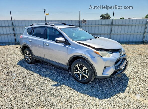 2T3WFREV2HW398174 2017 TOYOTA RAV4 Silver Przód prawy