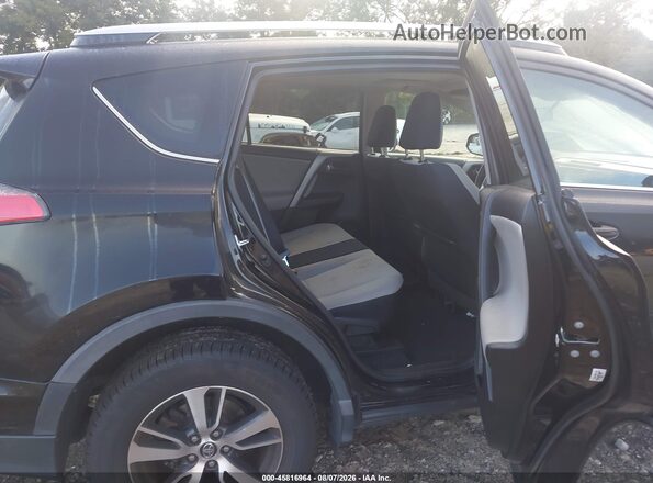 2T3WFREV3GW290029 2016 TOYOTA RAV4 Black Вид наклейки з VIN-кодом