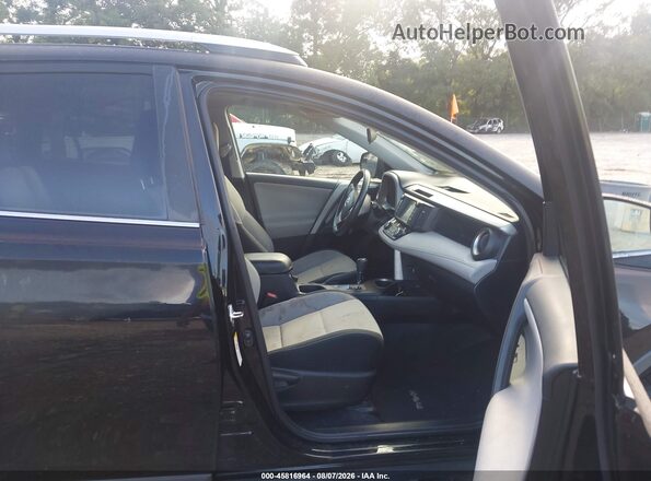2T3WFREV3GW290029 2016 TOYOTA RAV4 Black Вид салону спереду