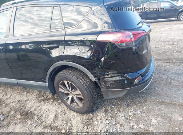 2T3WFREV3GW290029 2016 TOYOTA RAV4 Black Вид спереду
