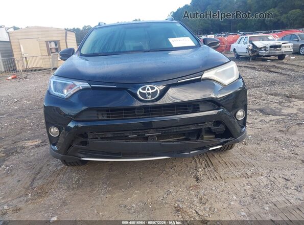2T3WFREV3GW290029 2016 TOYOTA RAV4 Black Вид щитка приладів