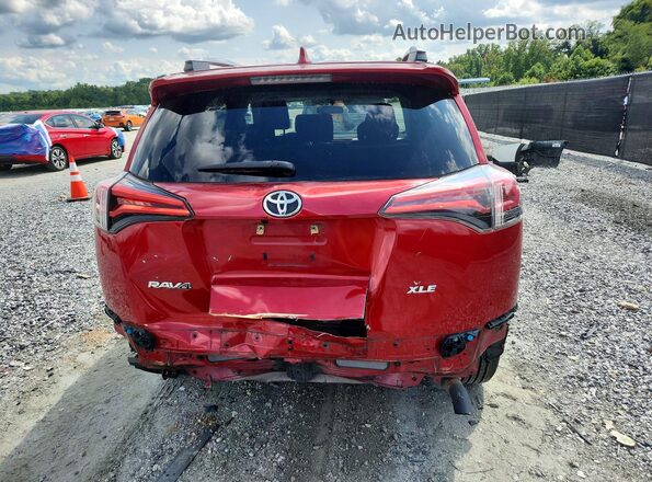 2T3WFREV4GW252695 2016 TOYOTA RAV4 Red Հետևի տեսք