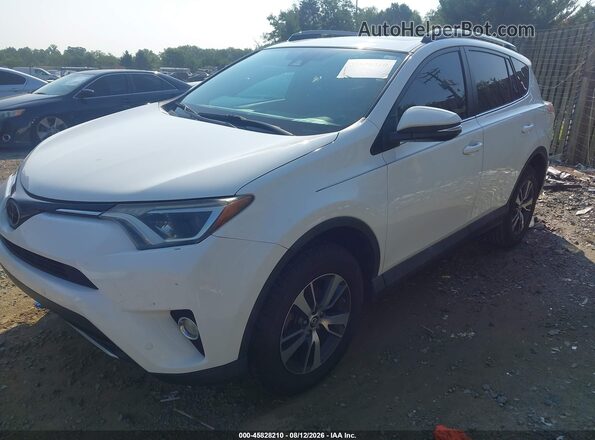 2T3WFREV4HW404864 2017 TOYOTA RAV4 White წინა მარცხენა ხედი სამი მეოთხედიდან