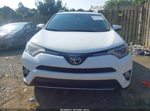 2T3WFREV4HW404864 2017 TOYOTA RAV4 White ხელსაწყოთა პანელის ხედი