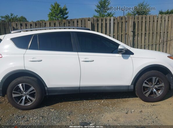 2T3WFREV4HW404864 2017 TOYOTA RAV4 White უკანა სალონის ხედი