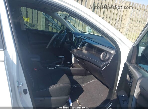 2T3WFREV4HW404864 2017 TOYOTA RAV4 White წინა სალონის ხედი