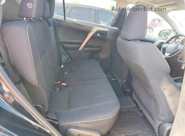 2T3WFREV4JW476282 2018 TOYOTA RAV4 Black Vista interior trasera