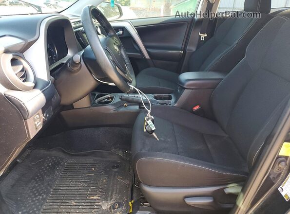2T3WFREV4JW476282 2018 TOYOTA RAV4 Black Vista interior delantera