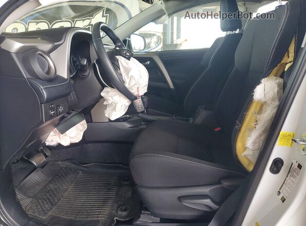 2T3WFREV5JW412638 2018 TOYOTA RAV4 Белый Вид салона спереди