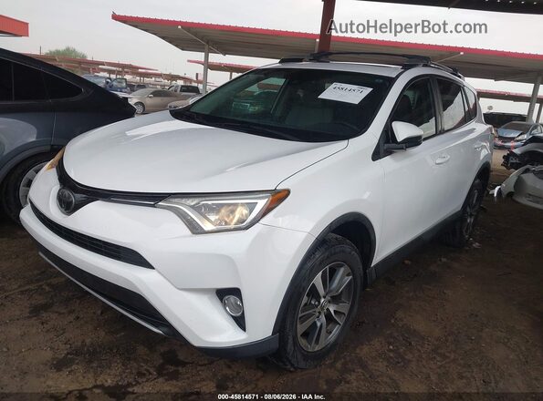 2T3WFREV5JW463444 2018 TOYOTA RAV4 White Front left