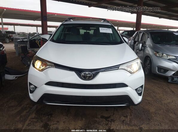 2T3WFREV5JW463444 2018 TOYOTA RAV4 White Rear interior view