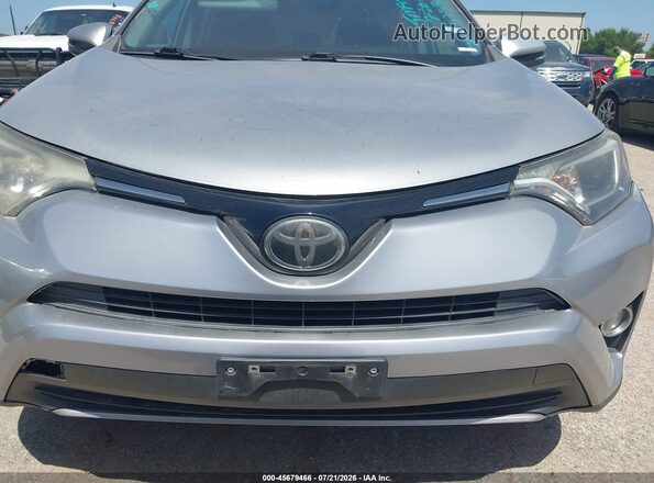 2T3WFREV5JW513310 2018 TOYOTA RAV4 Silver Դիմացի տեսք