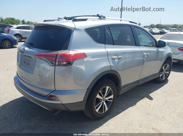 2T3WFREV5JW513310 2018 TOYOTA RAV4 Silver Հետևի աջ