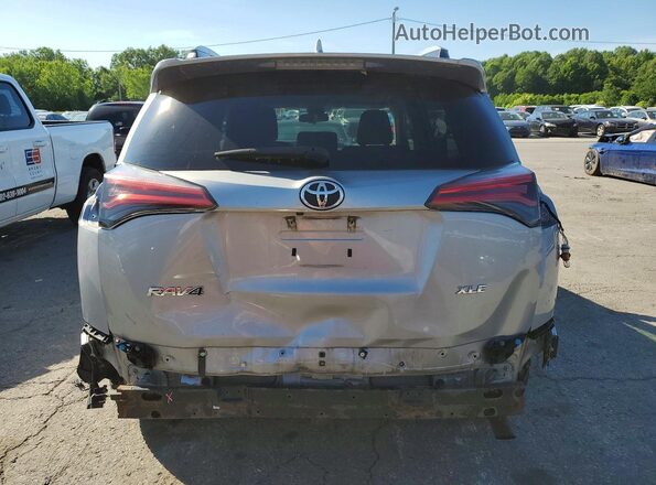 2T3WFREV6JW459967 2018 TOYOTA RAV4 Silver Вид ззаду