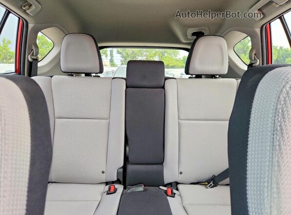 2T3WFREV7HW314642 2017 TOYOTA RAV4 Red Rear seats view