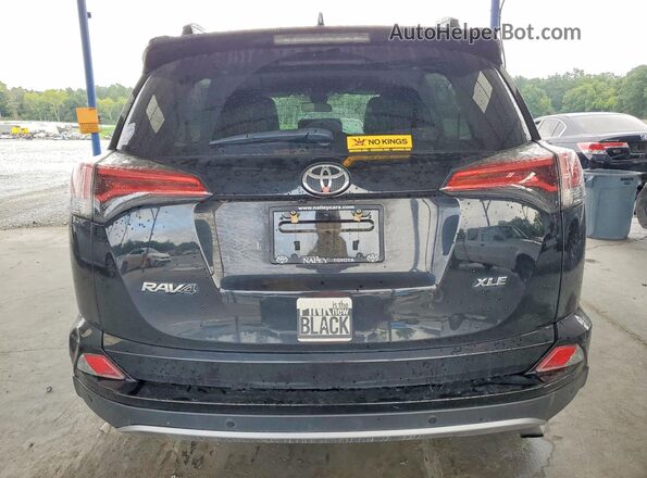 2T3WFREV7HW343395 2017 TOYOTA RAV4 Black Vista trasera