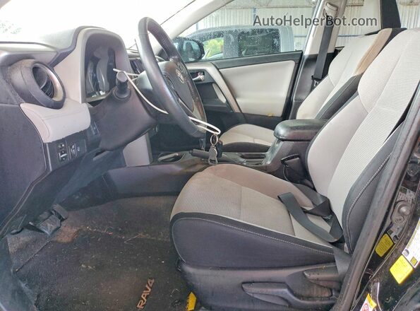 2T3WFREV7HW343395 2017 TOYOTA RAV4 Black Vista interior delantera
