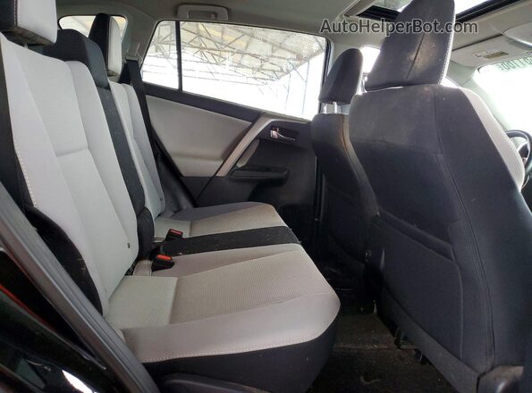 2T3WFREV7HW343395 2017 TOYOTA RAV4 Black Vista de los asientos traseros