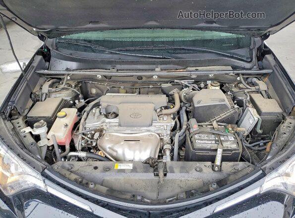 2T3WFREV7HW343395 2017 TOYOTA RAV4 Black Vista interior trasera