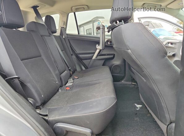 2T3WFREV7HW374159 2017 TOYOTA RAV4 Silver Вид задньої частини салону