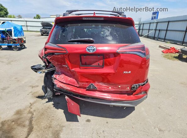 2T3WFREV7HW400663 2017 TOYOTA RAV4 Burgundy Widok z tyłu