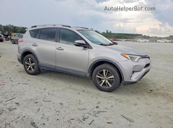 2T3WFREV7JW433216 2018 TOYOTA RAV4 Серебряный Передняя правая четверть