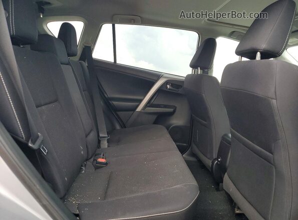 2T3WFREV7JW433216 2018 TOYOTA RAV4 Серебряный Вид задней части салона