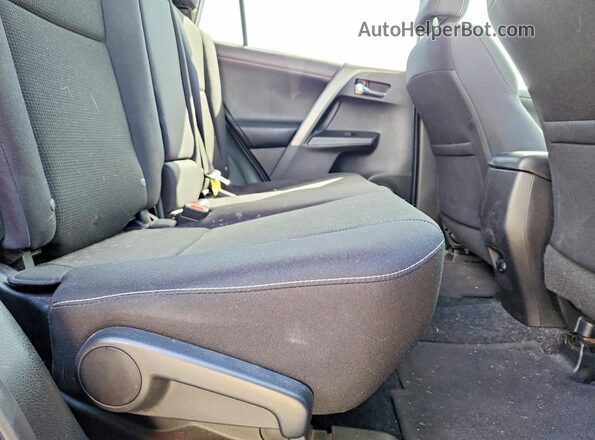 2T3WFREV7JW460044 2018 TOYOTA RAV4 Red Rear interior view