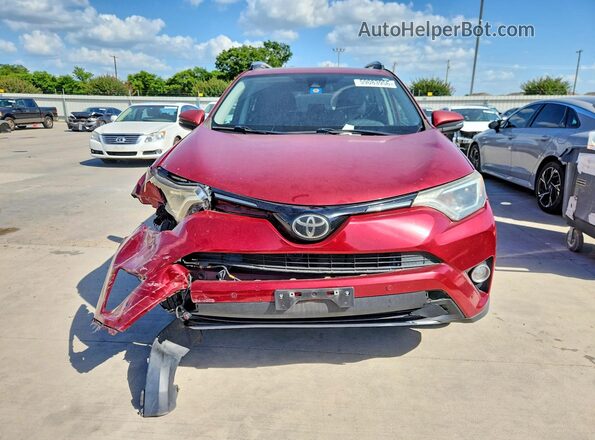 2T3WFREV7JW460044 2018 TOYOTA RAV4 Red Front view
