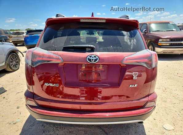 2T3WFREV7JW462392 2018 TOYOTA RAV4 Красный Вид салона спереди