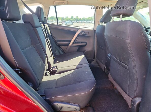 2T3WFREV7JW501434 2018 TOYOTA RAV4 Red Vista interior trasera