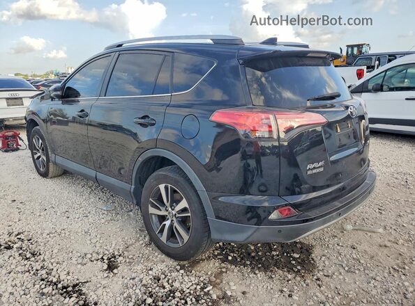 2T3WFREV7JW517682 2018 TOYOTA RAV4 Black Rear left